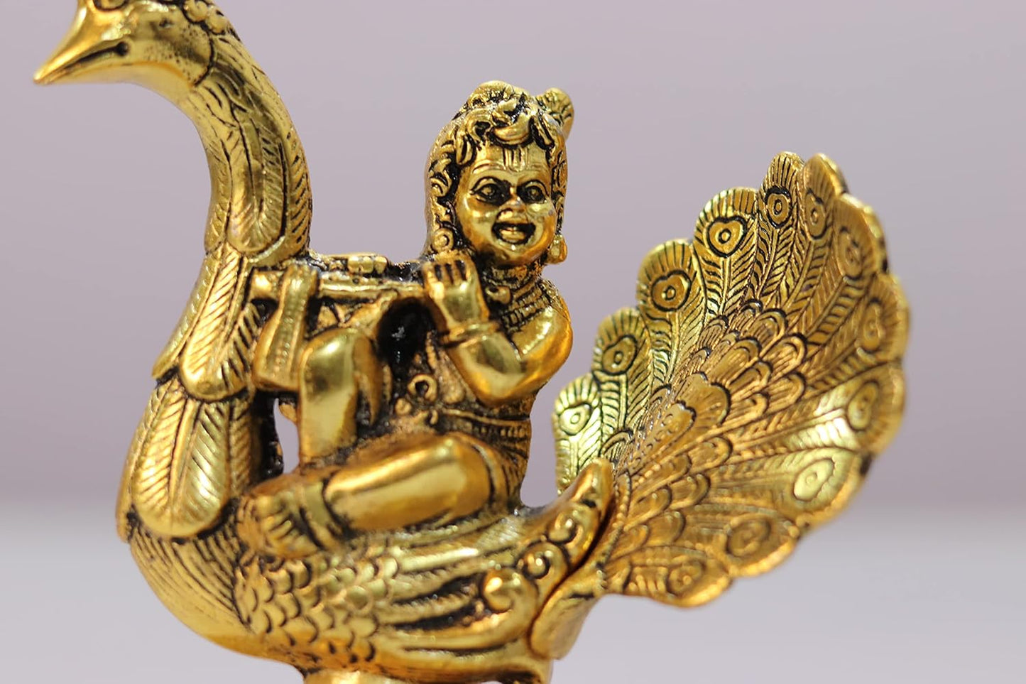 Golden Baby Krishna on Peacock